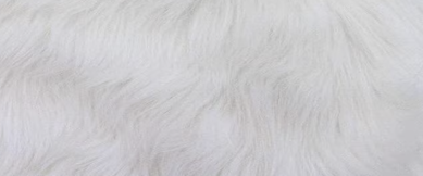 LONG FUR MAT WITH TASSELS