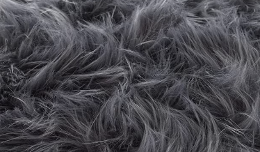 LONG FUR MAT WITH TASSELS