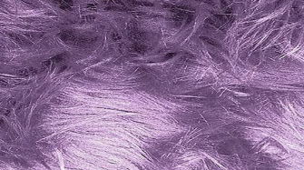 LONG FUR MAT WITH TASSELS